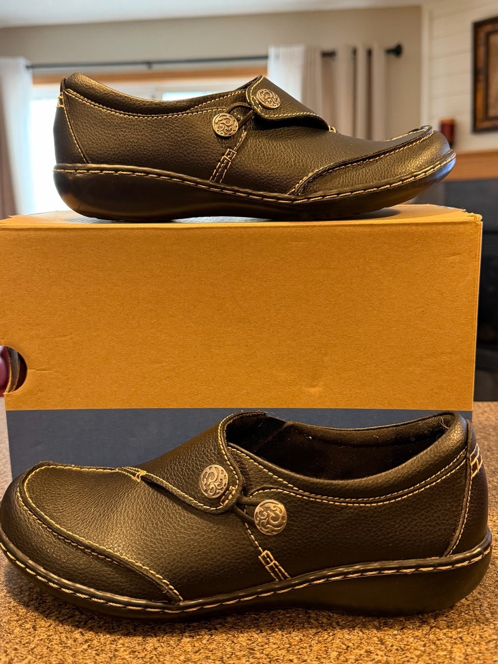 Womens Clarks Black Leather Slip-On Loafers with Button Accents